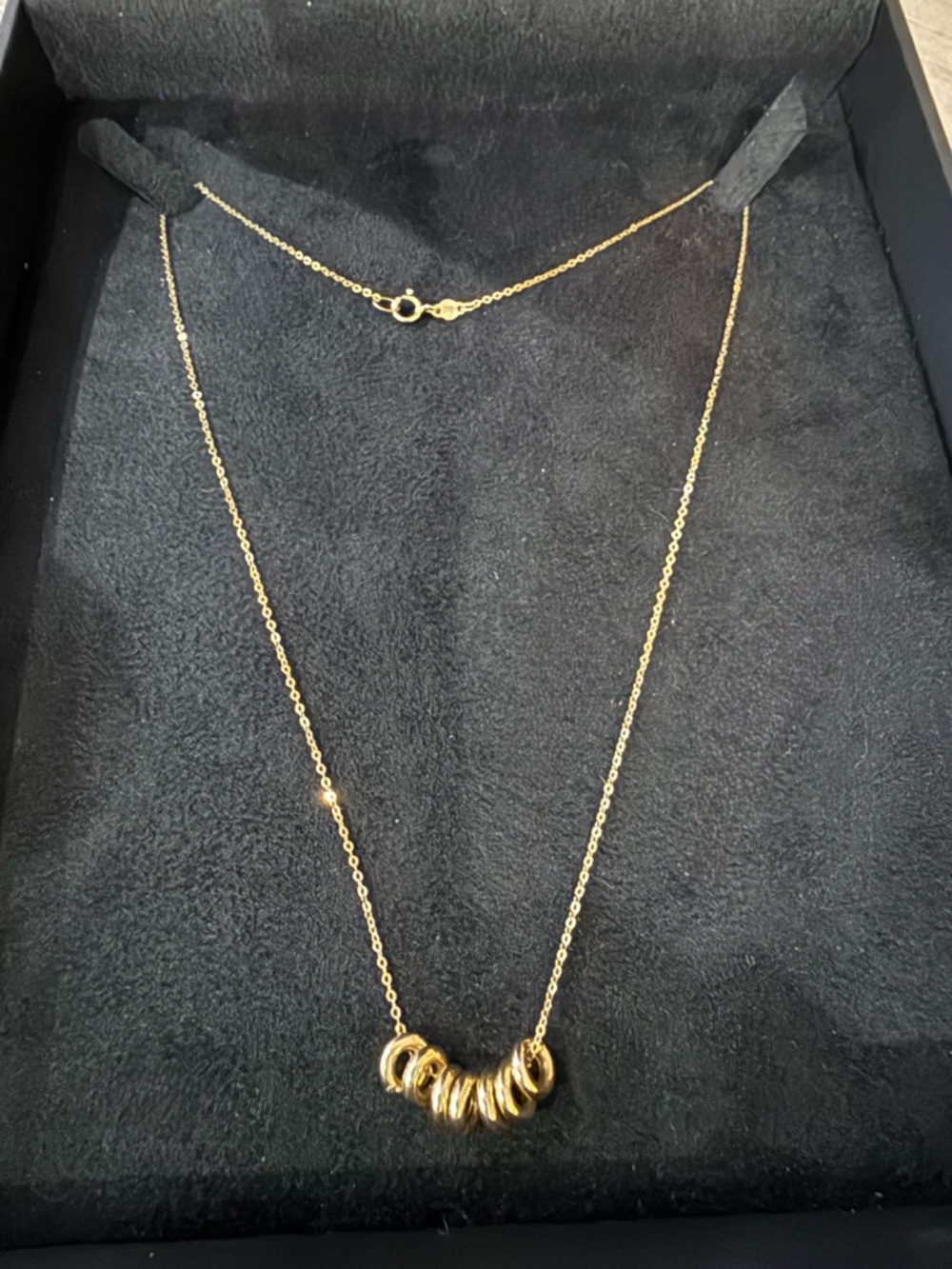 14k yellow gold seven Ring Necklace for Women.  18” cable chain. Never worn.